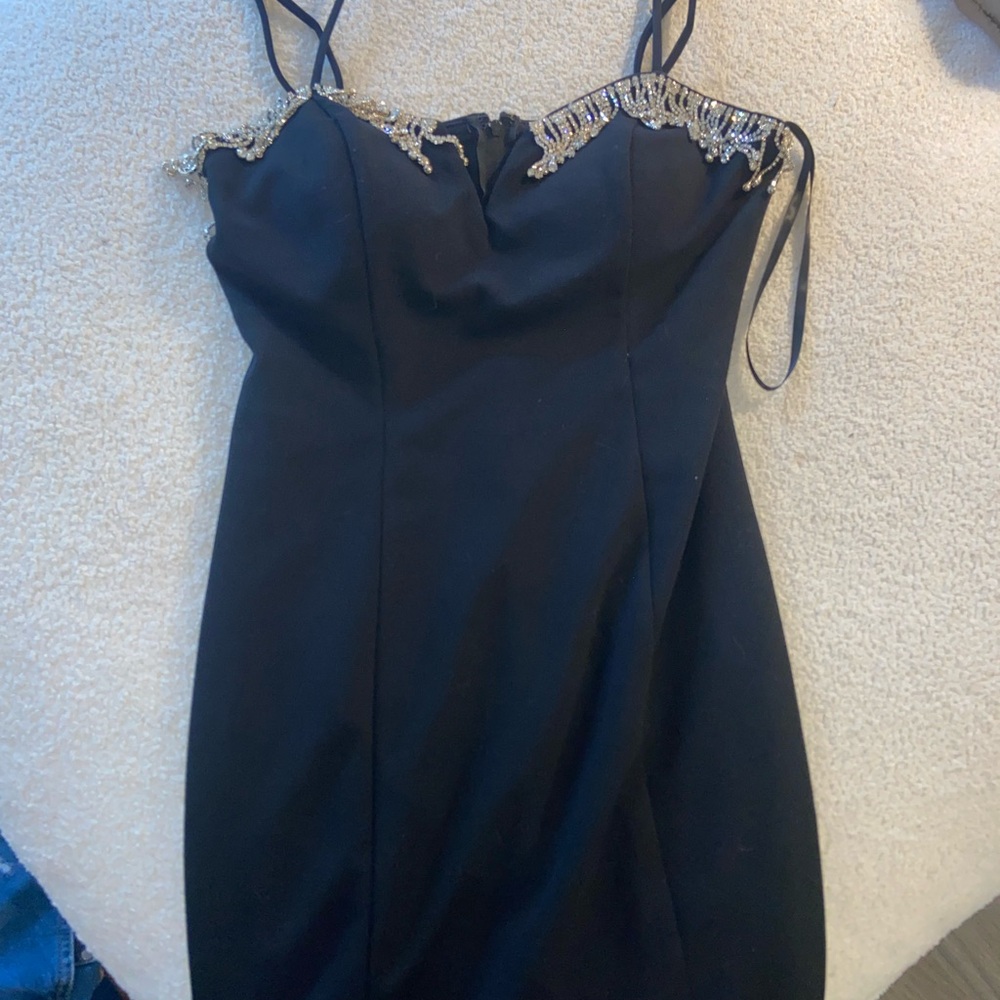 Elegant Black Dress with Embellished Details